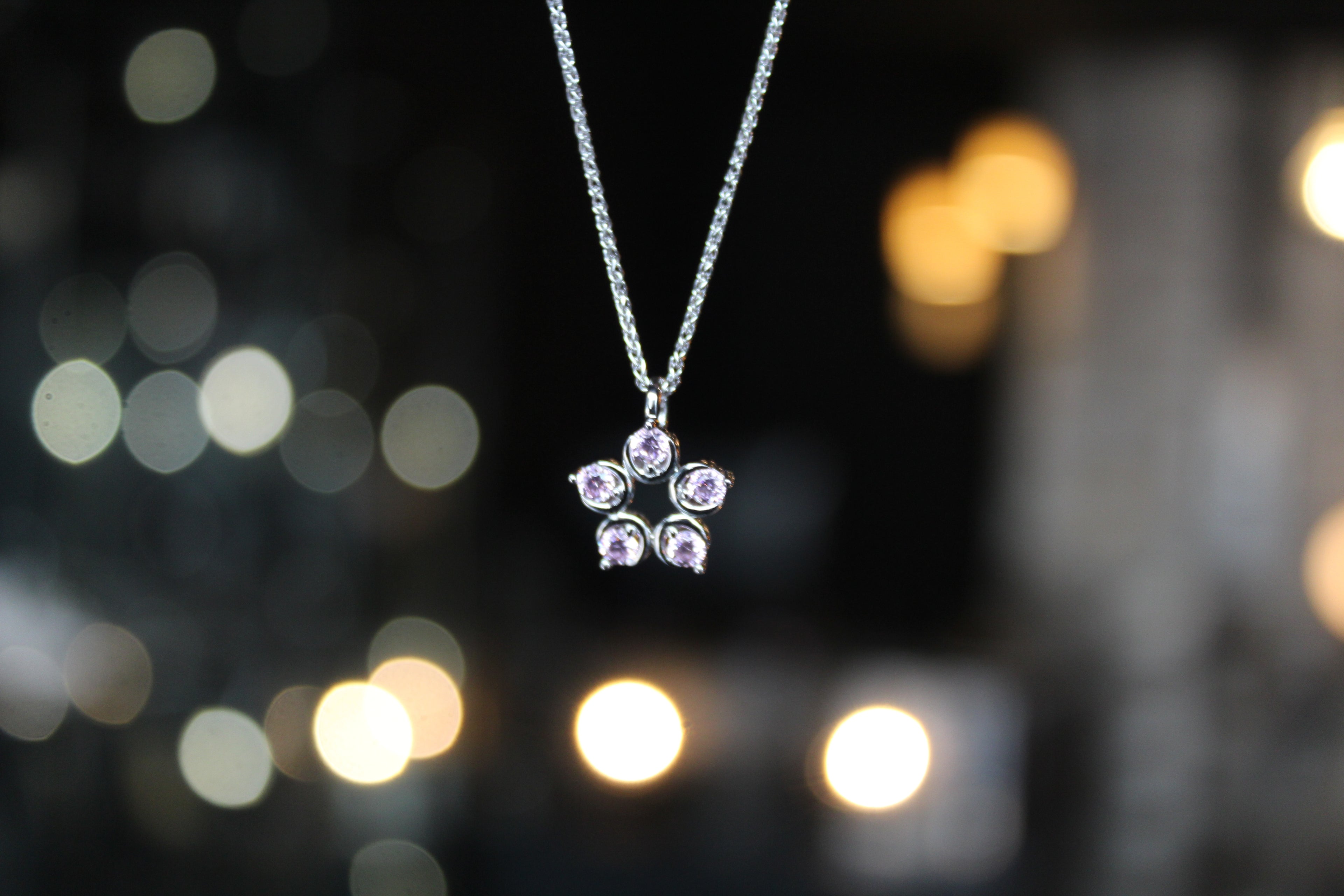 Pink Diamond Cubic Zirconia Flower Pendant with a 16-18" Silver Chain
