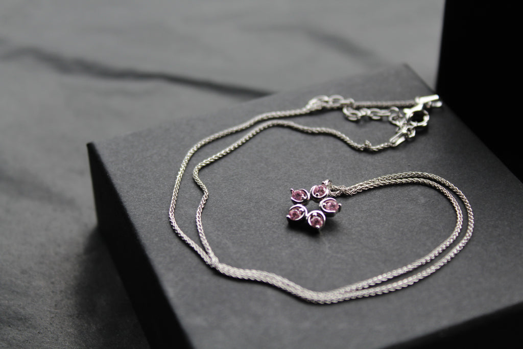 Pink Diamond Cubic Zirconia Flower Pendant with a 16-18" Silver Chain
