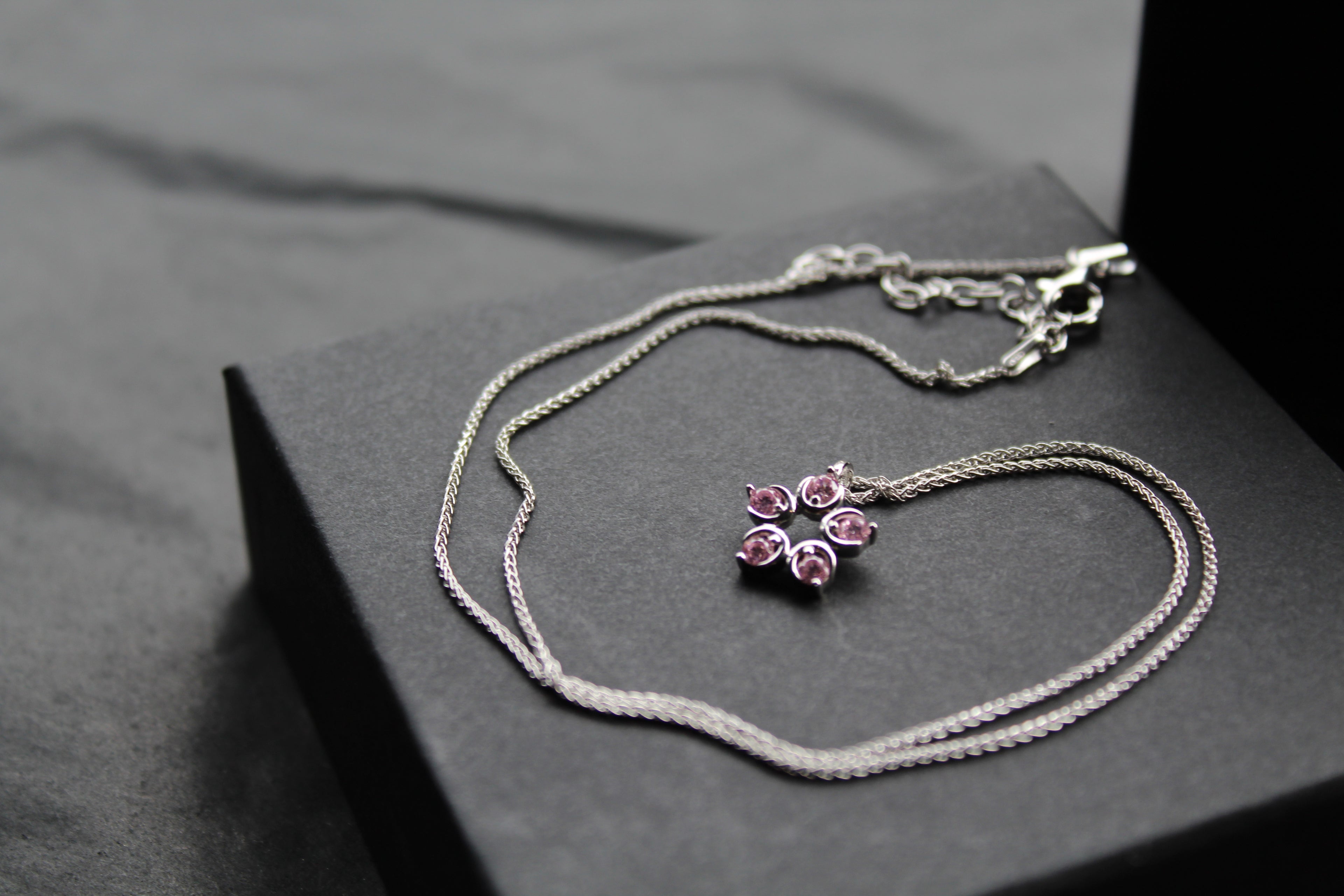 Pink Diamond Cubic Zirconia Flower Pendant with a 16-18" Silver Chain