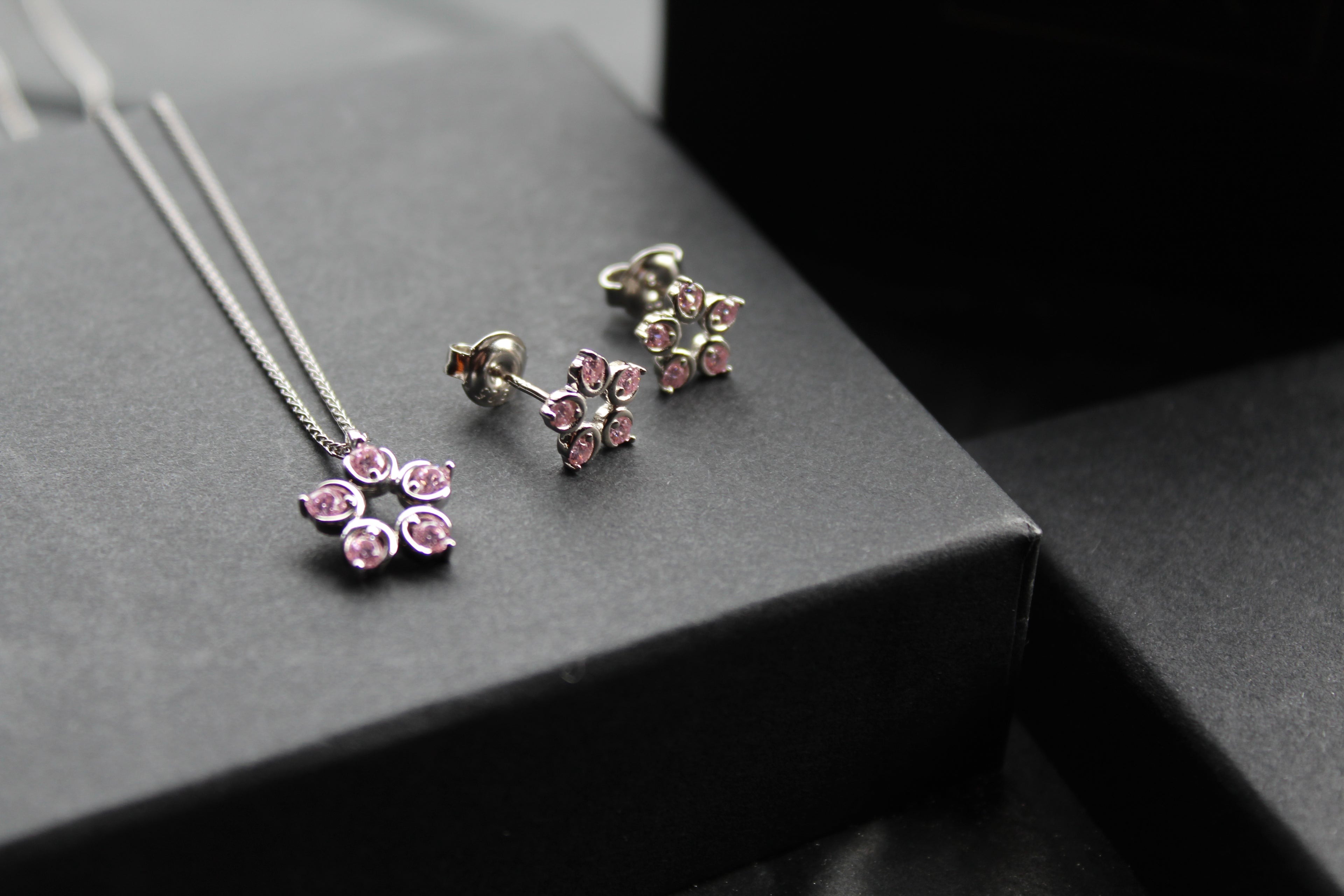 Pink Diamond Cubic Zirconia Flower Pendant with a 16-18" Silver Chain