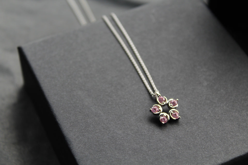 Pink Diamond Cubic Zirconia Flower Pendant with a 16-18" Silver Chain