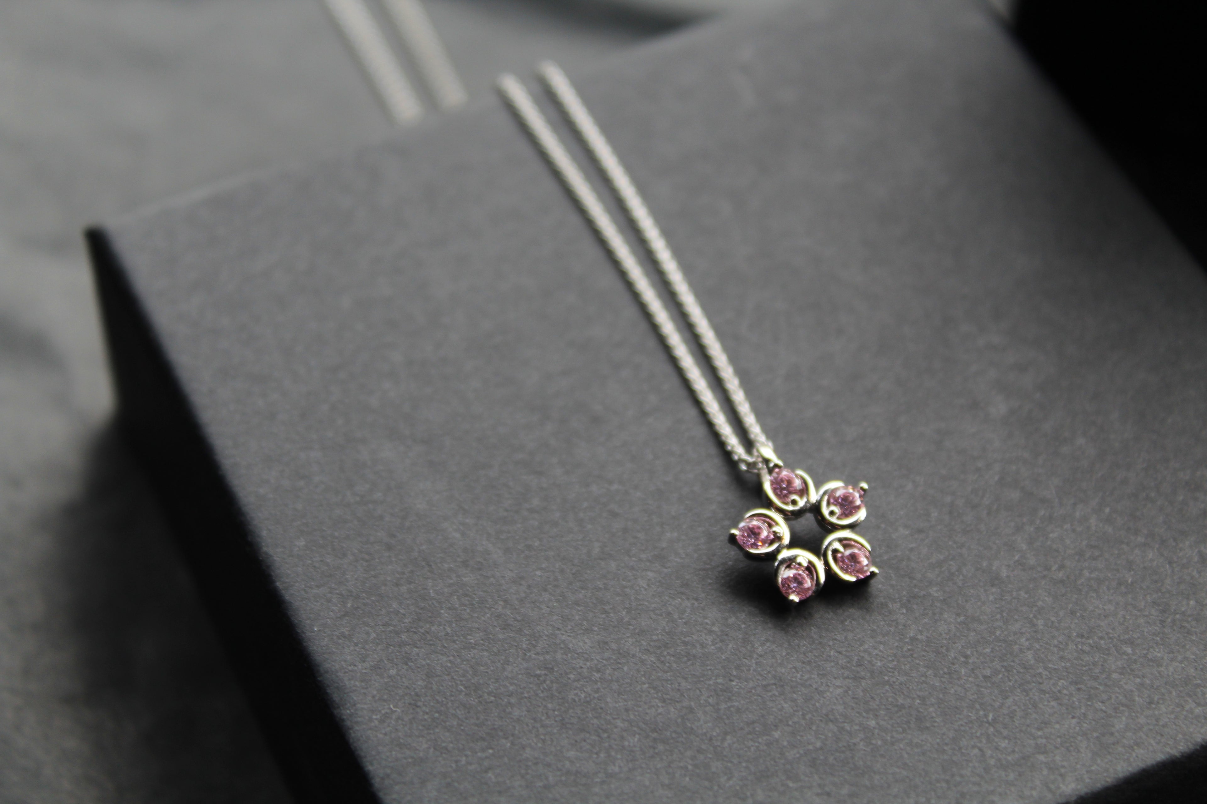 Pink Diamond Cubic Zirconia Flower Pendant with a 16-18" Silver Chain