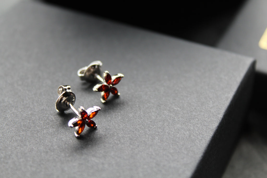Ruby CZ Star Flower Earrings