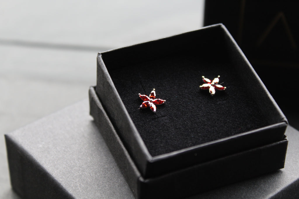 Ruby CZ Star Flower Earrings