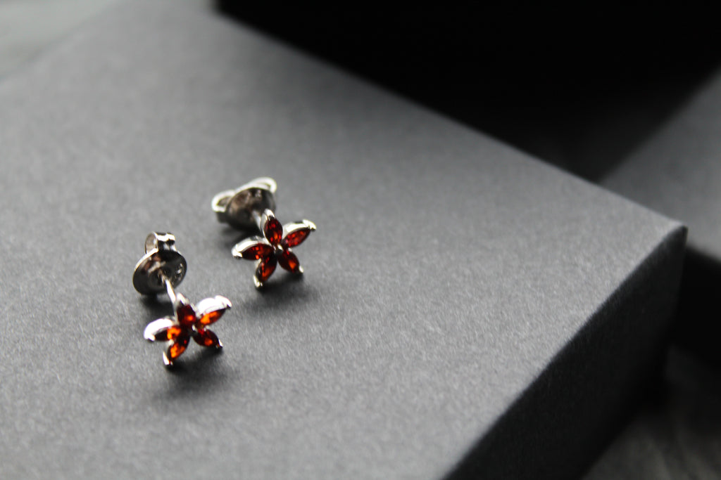 Ruby CZ Star Flower Earrings