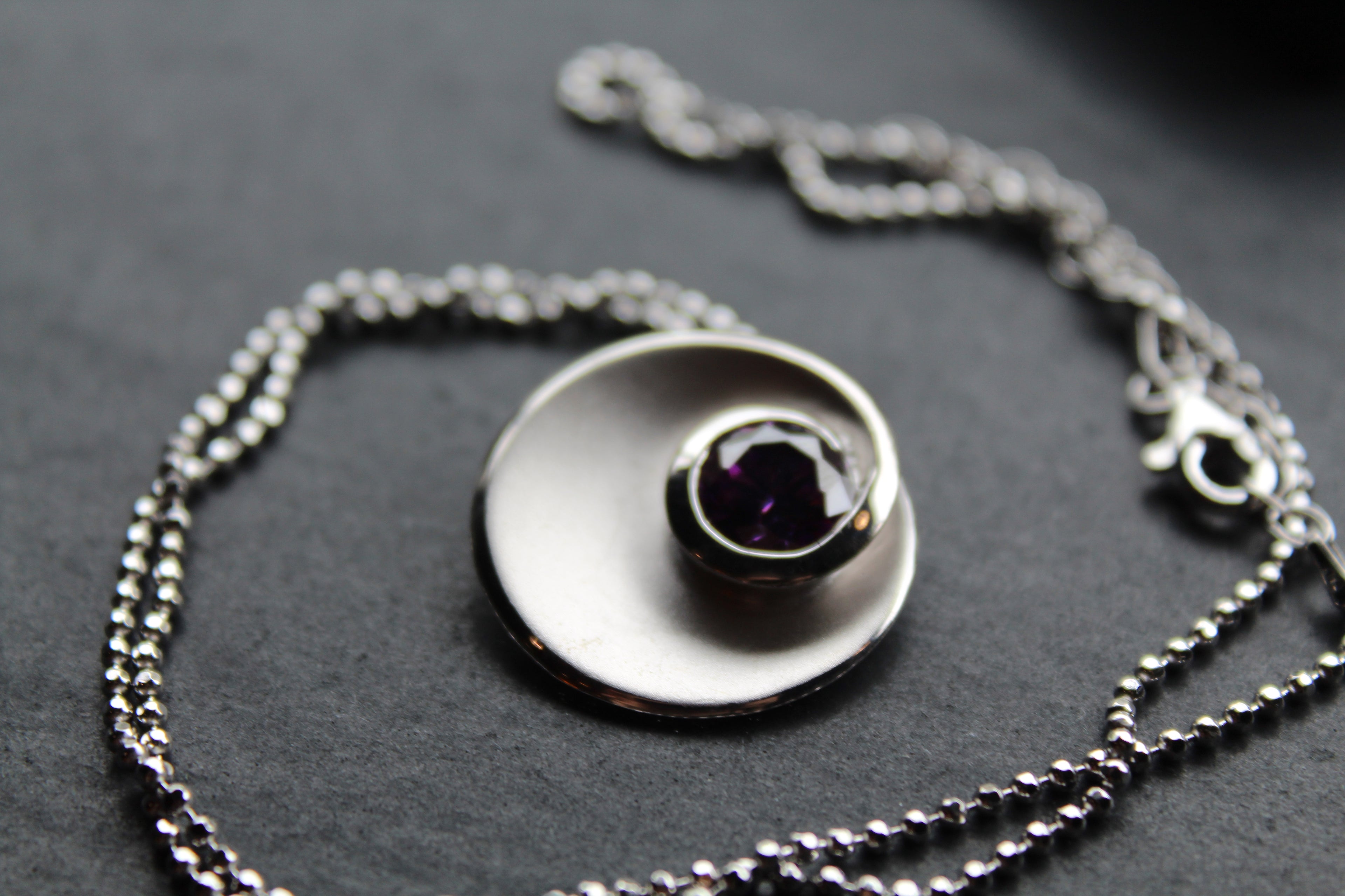 Silver & Amethyst Cubic Zirconia Swirl Pendant