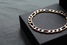 Load image into Gallery viewer, Steel Figaro Bracelet with Polished Rose IP
