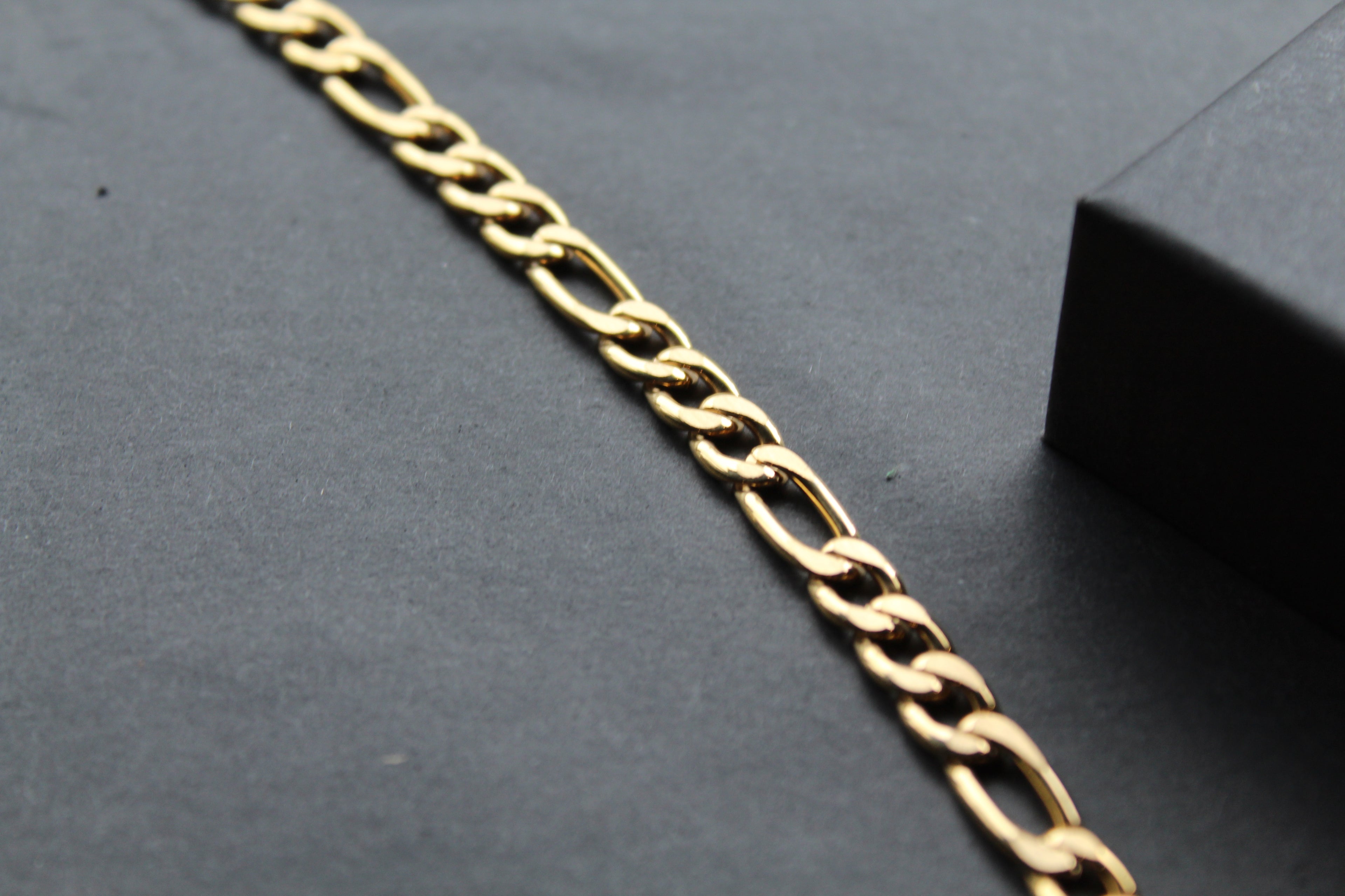 Steel Figaro Chain with Yellow Gold IP