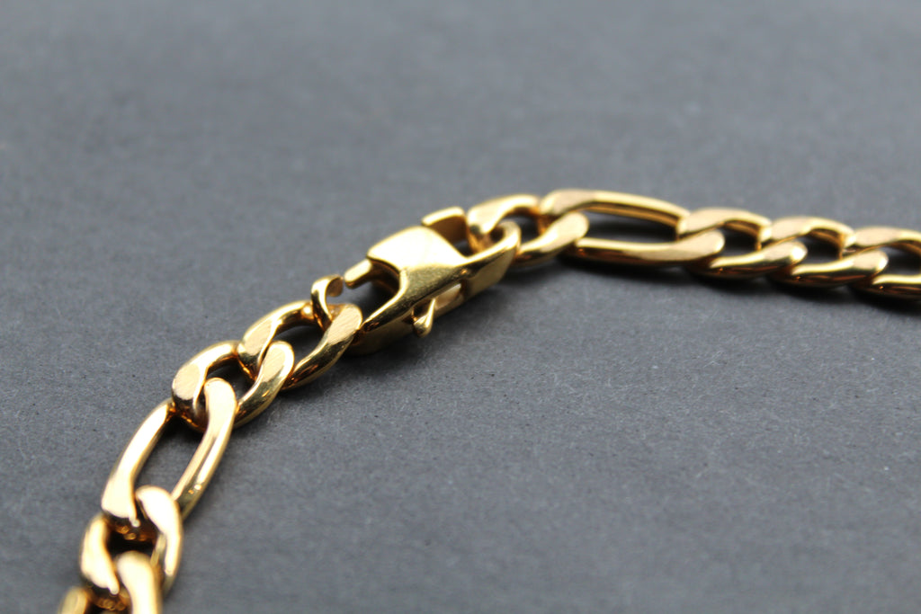 Steel Figaro Chain with Yellow Gold IP