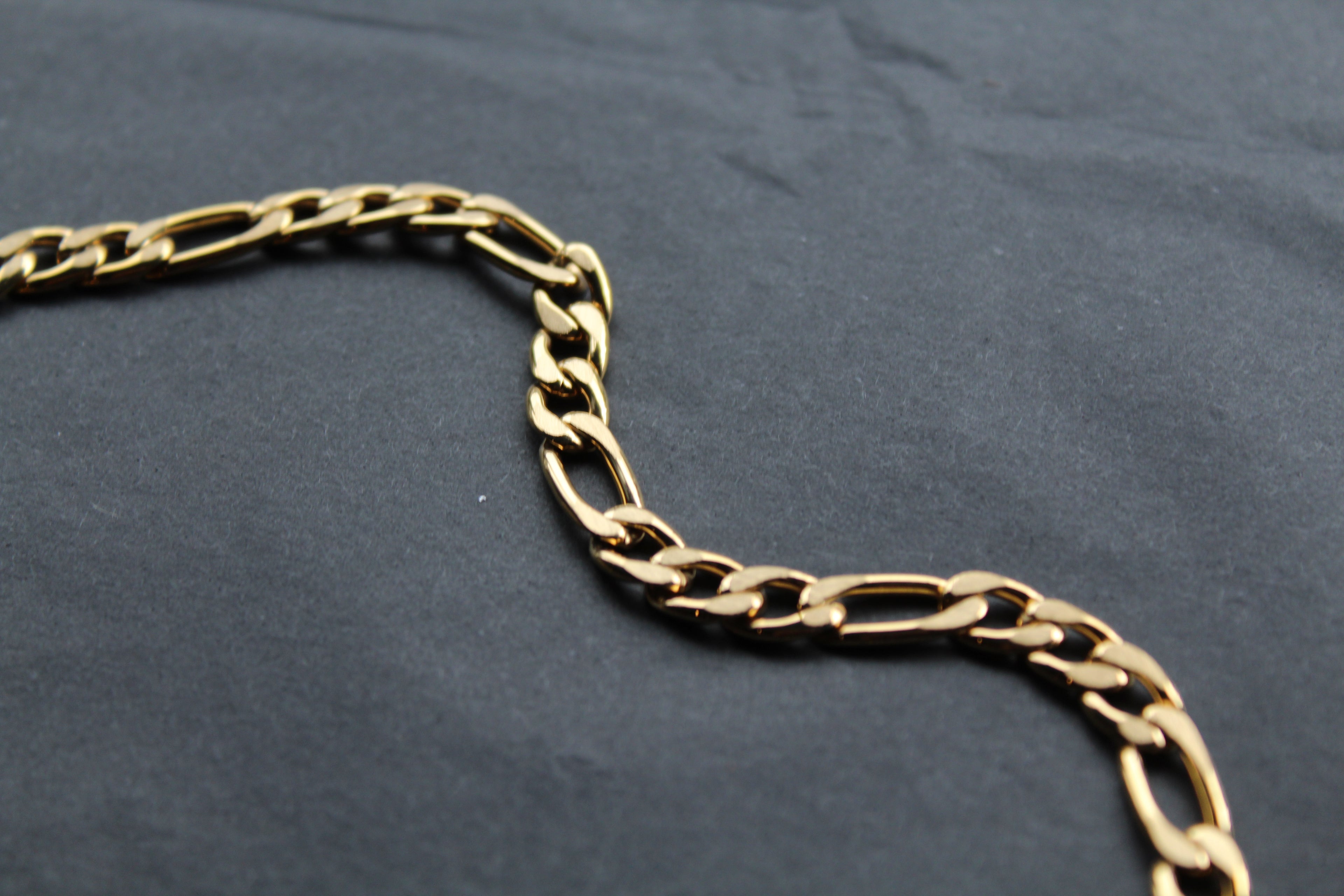 Steel Figaro Chain with Yellow Gold IP