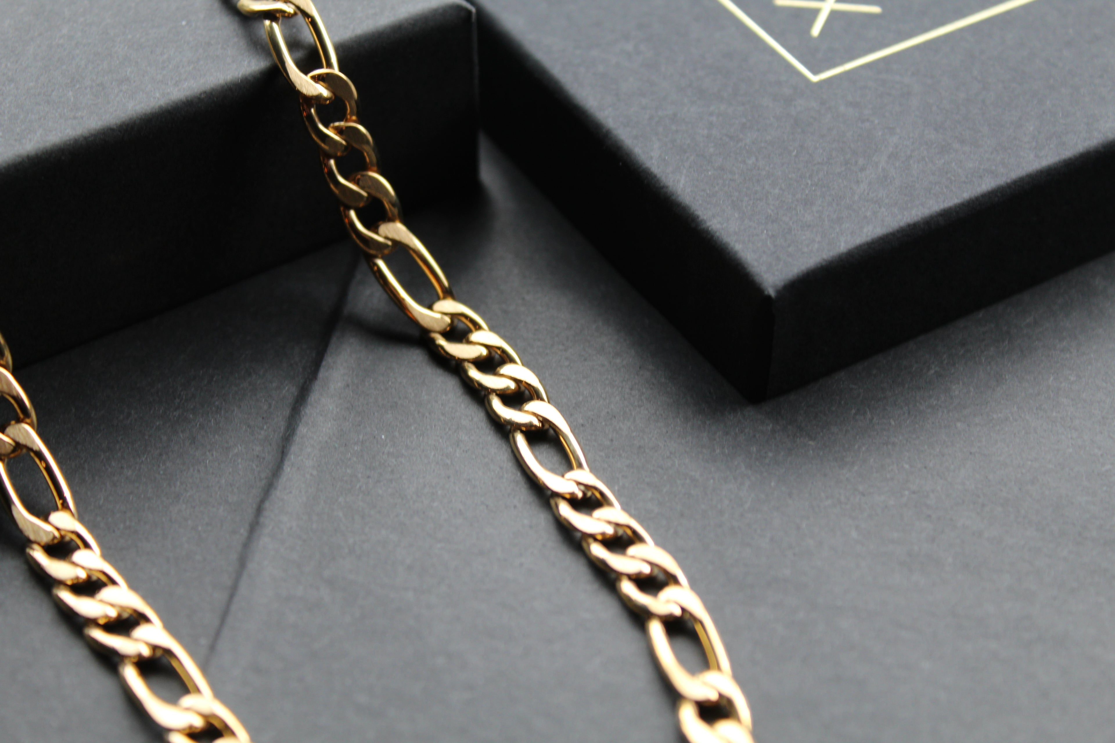 Steel Figaro Chain with Yellow Gold IP