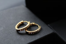 Load image into Gallery viewer, Sterling Silver, Yellow Gold Plated  CZ Oval Huggie Hoops
