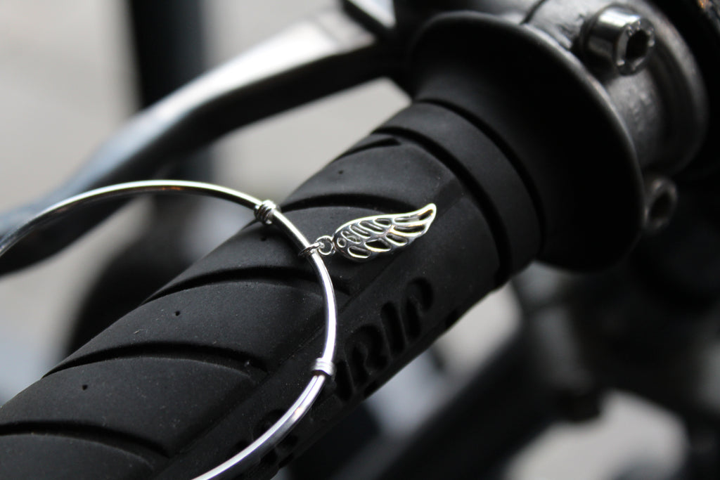 Silver Cuff with angel wing charm
