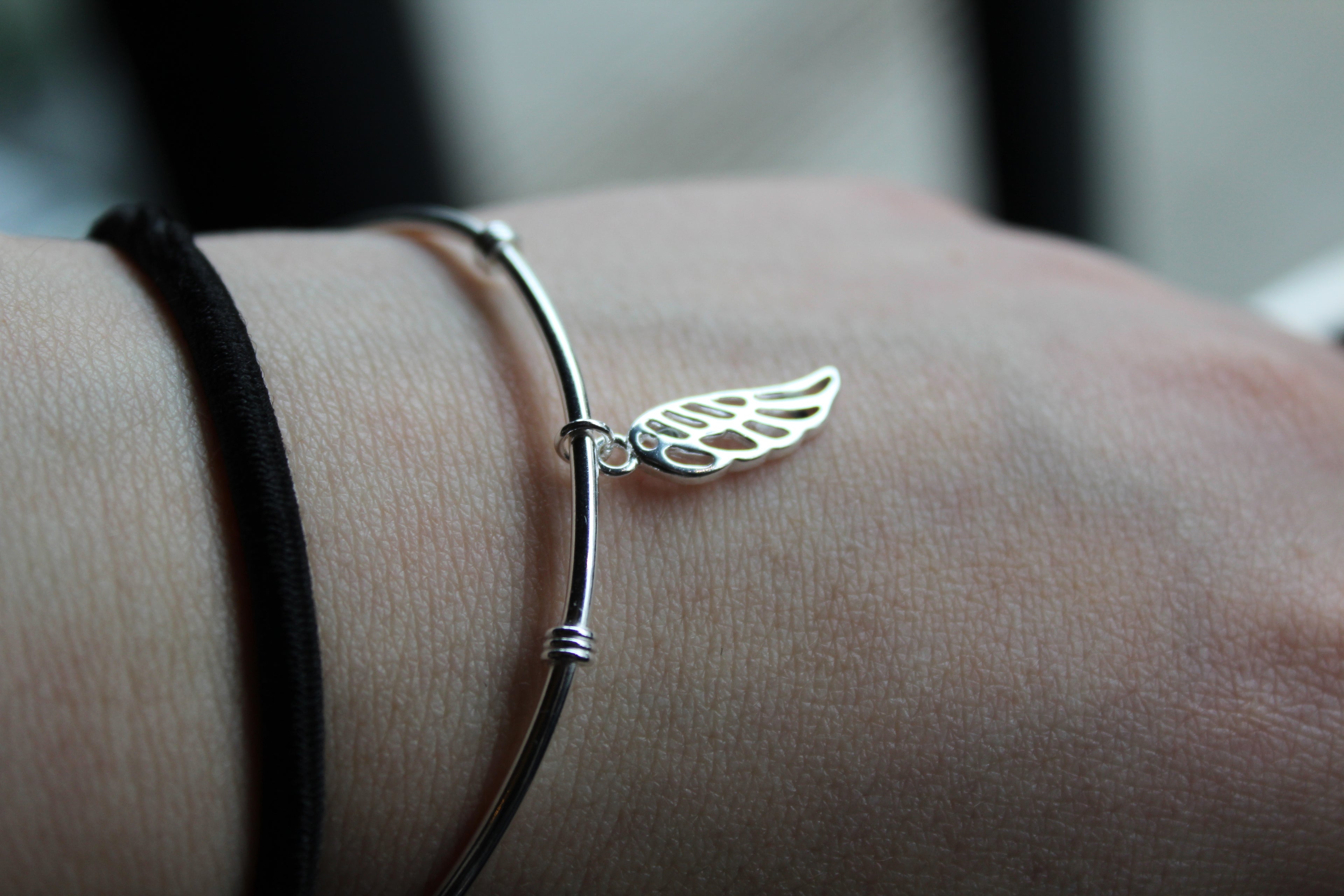 Silver Cuff with angel wing charm