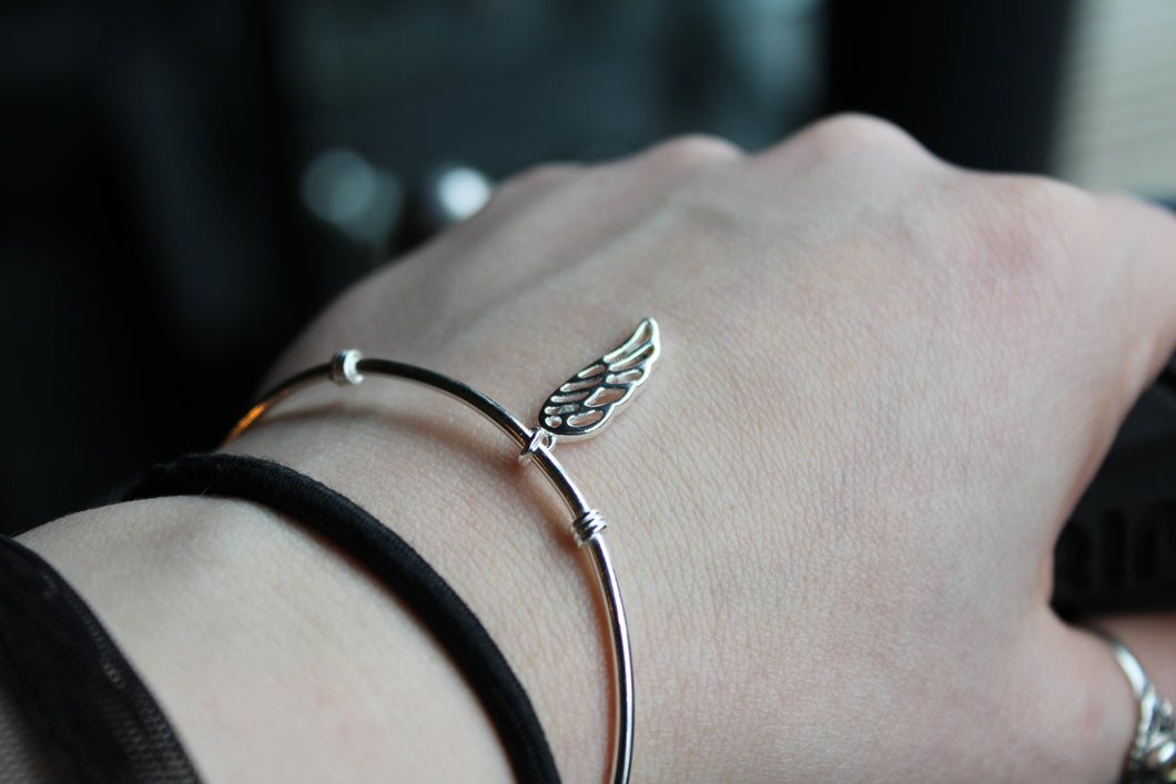 Silver Cuff with angel wing charm