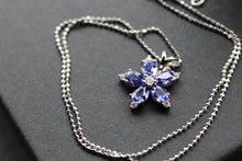 Load image into Gallery viewer, Silver &amp; Tanzanite CZ Flower Pendant with 16-18&quot; Silver Chain
