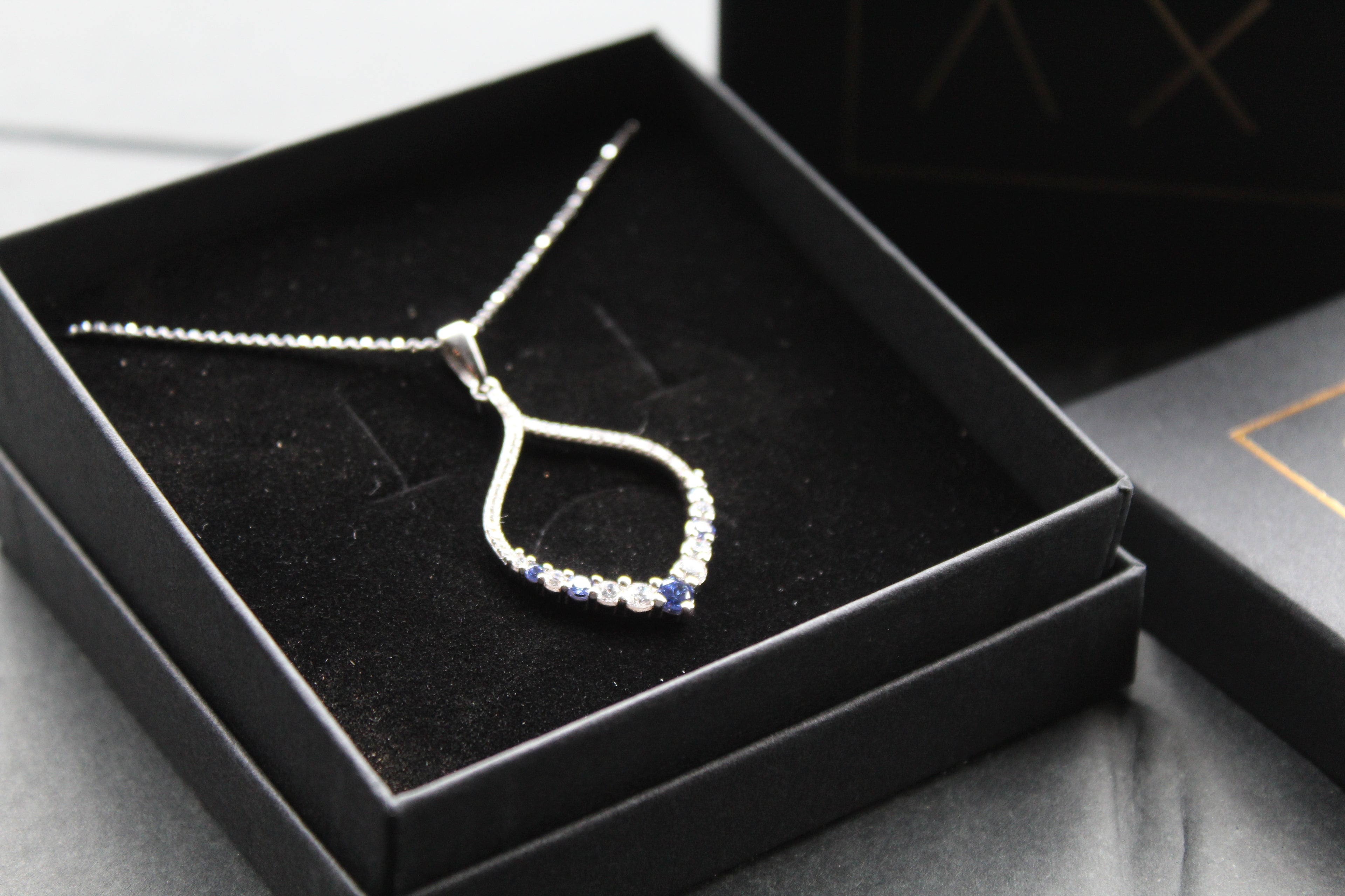 Tanzanite CZ Loop Pendant 16" Chain