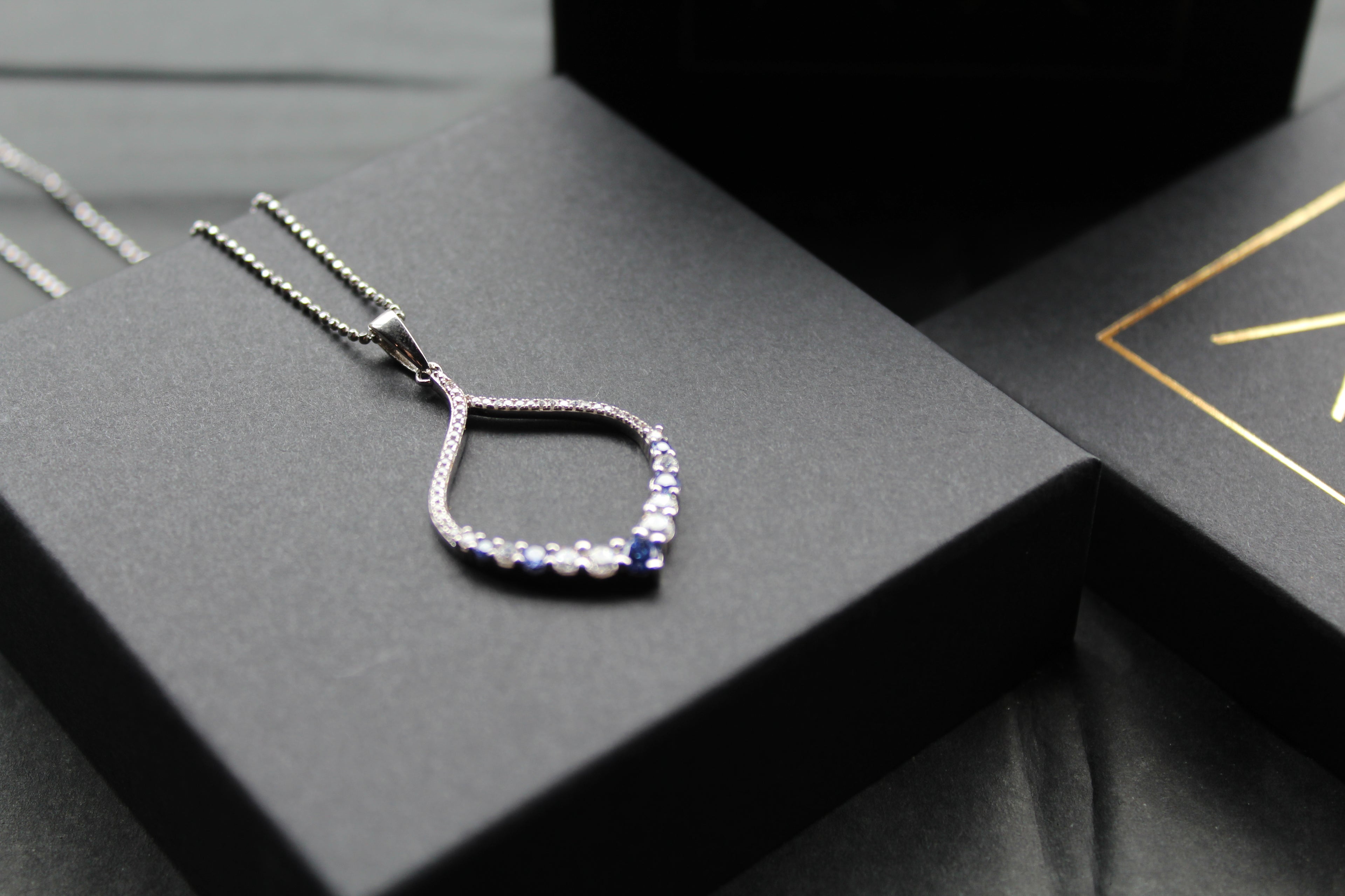Tanzanite CZ Loop Pendant 16" Chain