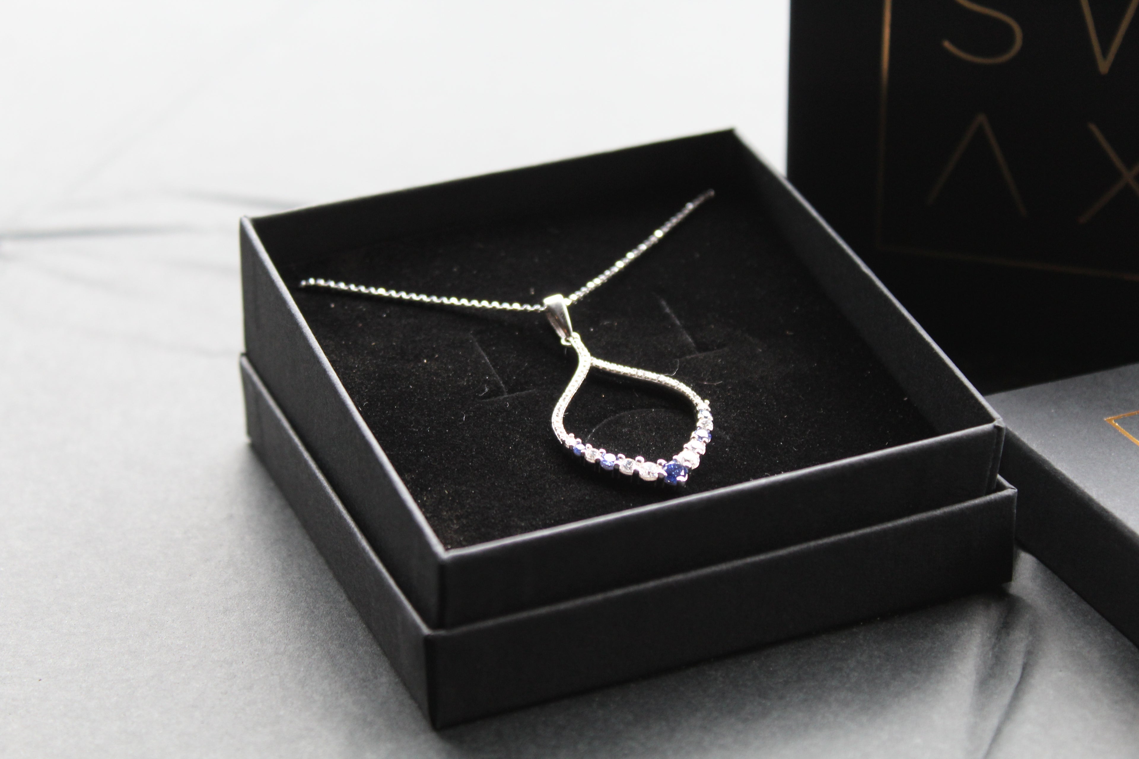 Tanzanite CZ Loop Pendant 16" Chain