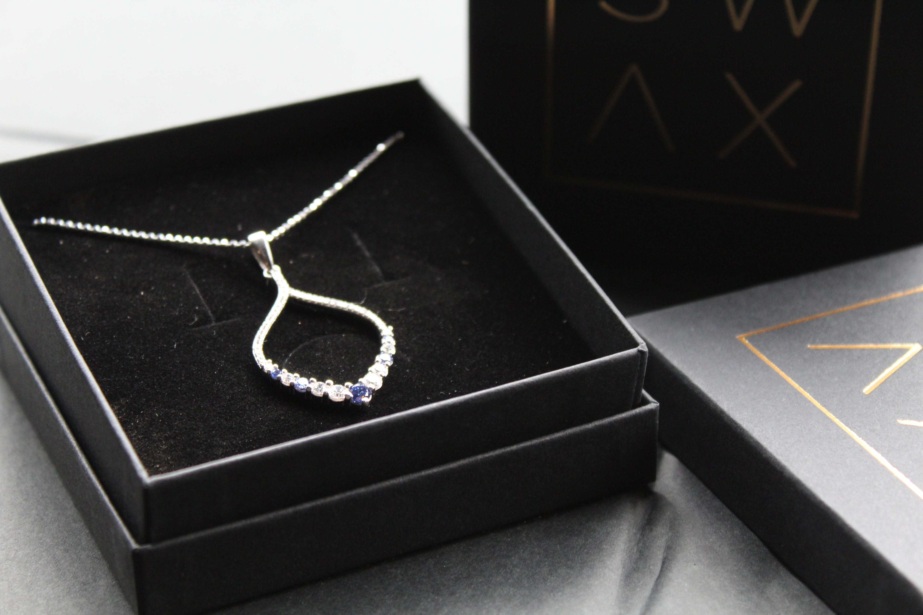 Tanzanite CZ Loop Pendant 16" Chain