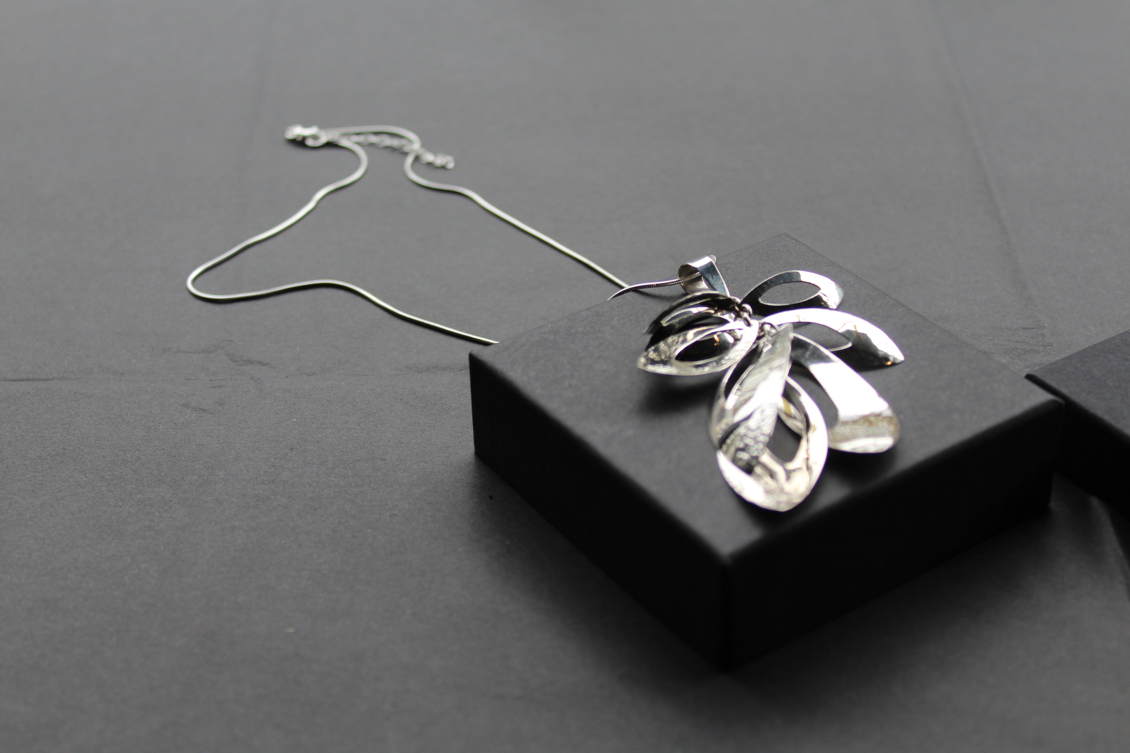 Tumbling Leaves Silver Pendant with 18-20" Chain